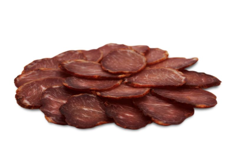 Lomo Ibérico de Bellota cortado sobre tabla jamonera - Jamones y Embutidos El Rubio